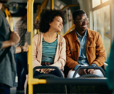 Happy,African,American,Couple,Looking,Through,The,Window,While,Traveling