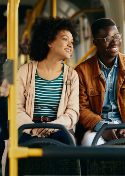Happy,African,American,Couple,Looking,Through,The,Window,While,Traveling