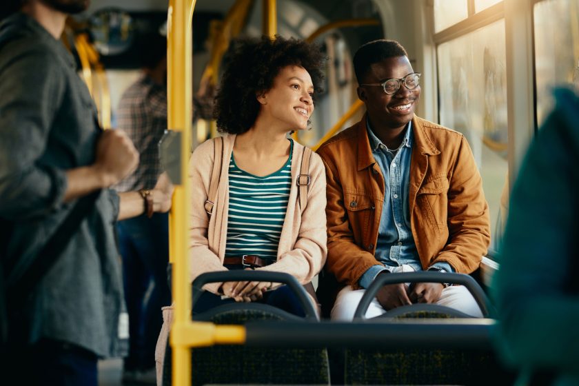 Happy,African,American,Couple,Looking,Through,The,Window,While,Traveling