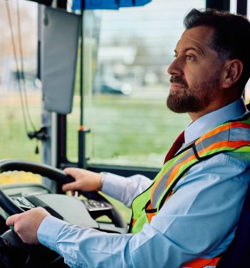 Bus,Driver,Waiting,For,Passengers,To,Board,The,Vehicle.